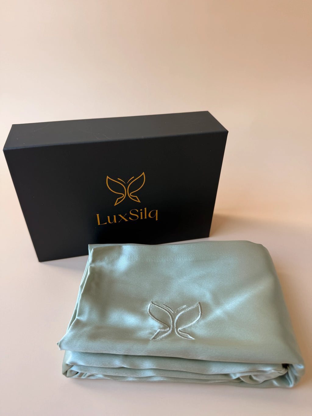 LuxSilq silk sheet set with packaging on a light background
#color_fresh sage