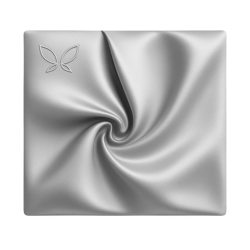Silver compact powder with butterfly logo on a white background
moonlight